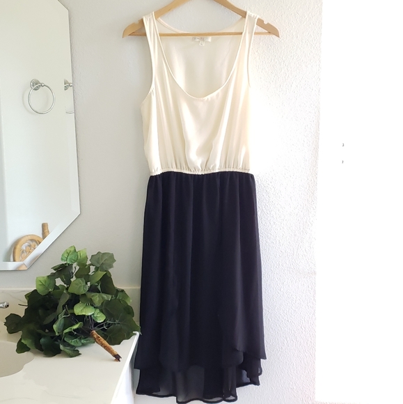 love, Fire Dresses & Skirts - Love, Fire Cream Black Sleeveless Dress Size Large